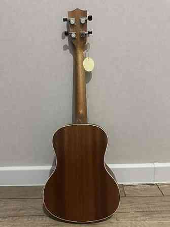 Укулеле Hricane (бренд на головке грифа). Формат корпуса — тенор Бишкек