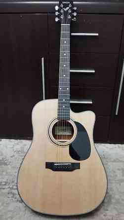 SAGA SF600C — это акустическая гитара формата Dreadnought (41