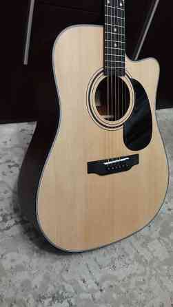 SAGA SF600C — это акустическая гитара формата Dreadnought (41