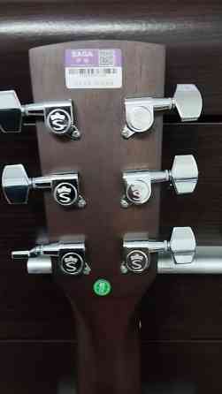 SAGA SF600C — это акустическая гитара формата Dreadnought (41