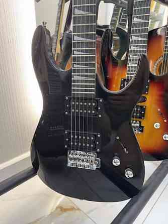 Электрогитара в комплекте струны, плотный чехол, 3 медиатора, ремень Бишкек