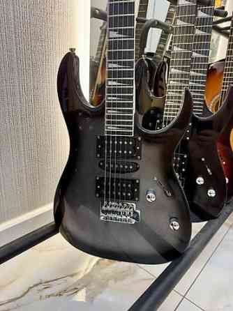 Электрогитара в комплекте струны, плотный чехол, 3 медиатора, ремень Бишкек