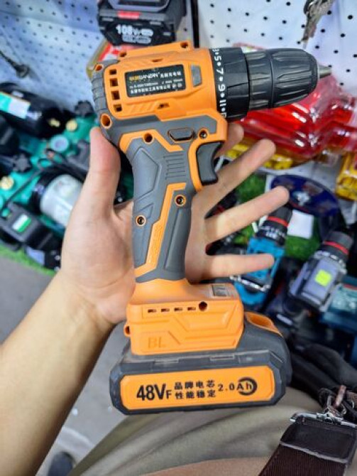 Аккумуляторная дрель-шуруповерт оранжевого и серого цвета с Bishkek - photo 2