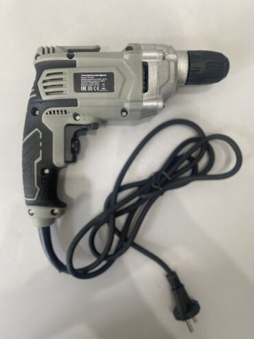 Электрическая дрель 