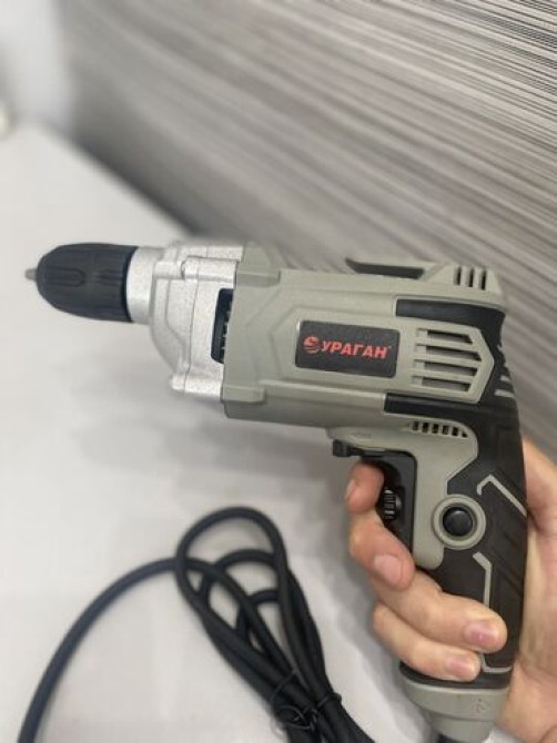 Электрическая дрель 