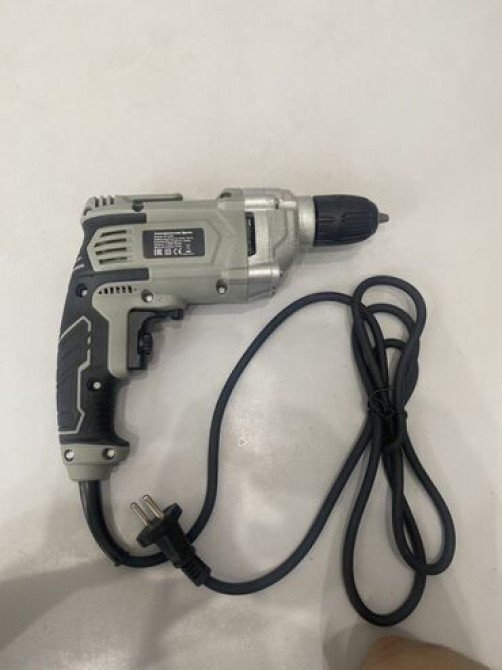 Электрическая дрель 