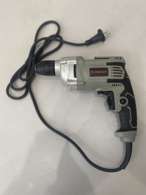 Электрическая дрель 