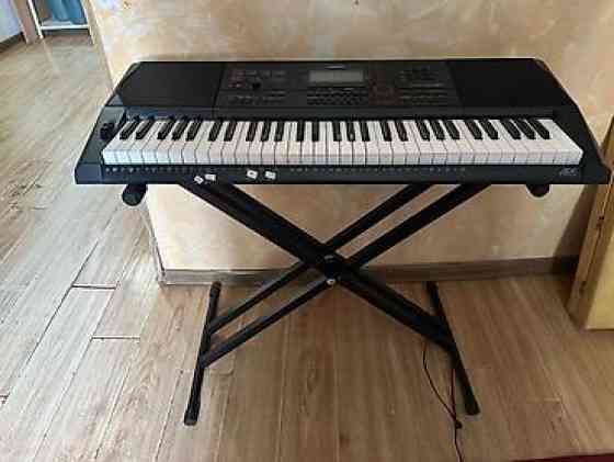 Синтезатор Casio (серия AiX) на стойке типа «икс».состояние Бишкек