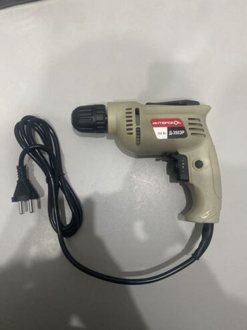 Электрическая дрель 