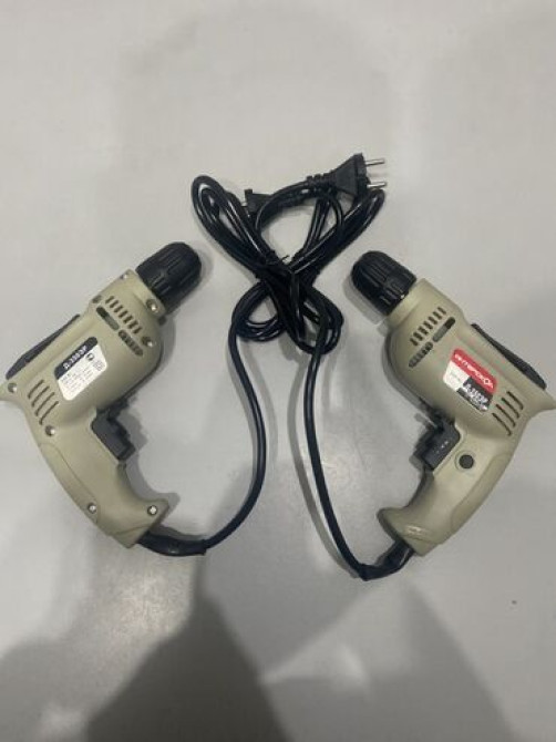 Электрическая дрель 