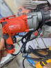 Электродрель D-MAX DM10010, выполненная в оранжево-черном корпусе Бишкек