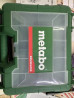 Дрели Metabo, представленный в прочном зеленом кейсе. Кейс имеет Бишкек