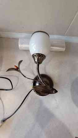 Светильник новый 
крепится на стену Bishkek