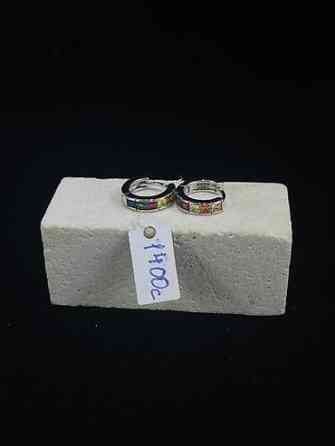 Элегантные серьги-кольца серебристого цвета, украшенные россыпью Бишкек